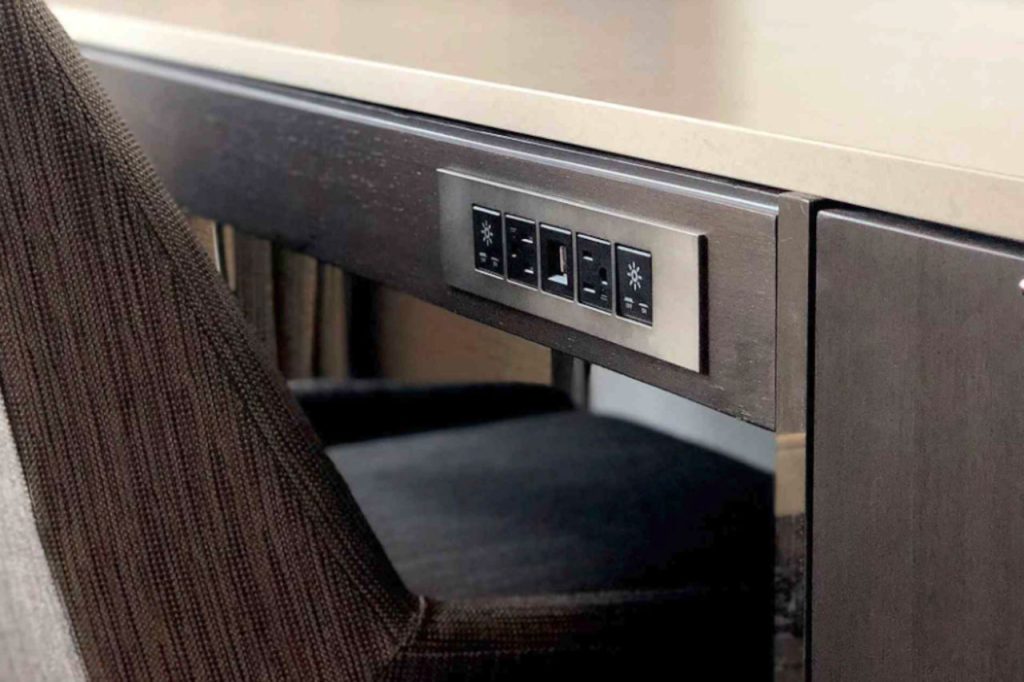 Metro Light And Power Outlets Built Into Hotel Desk